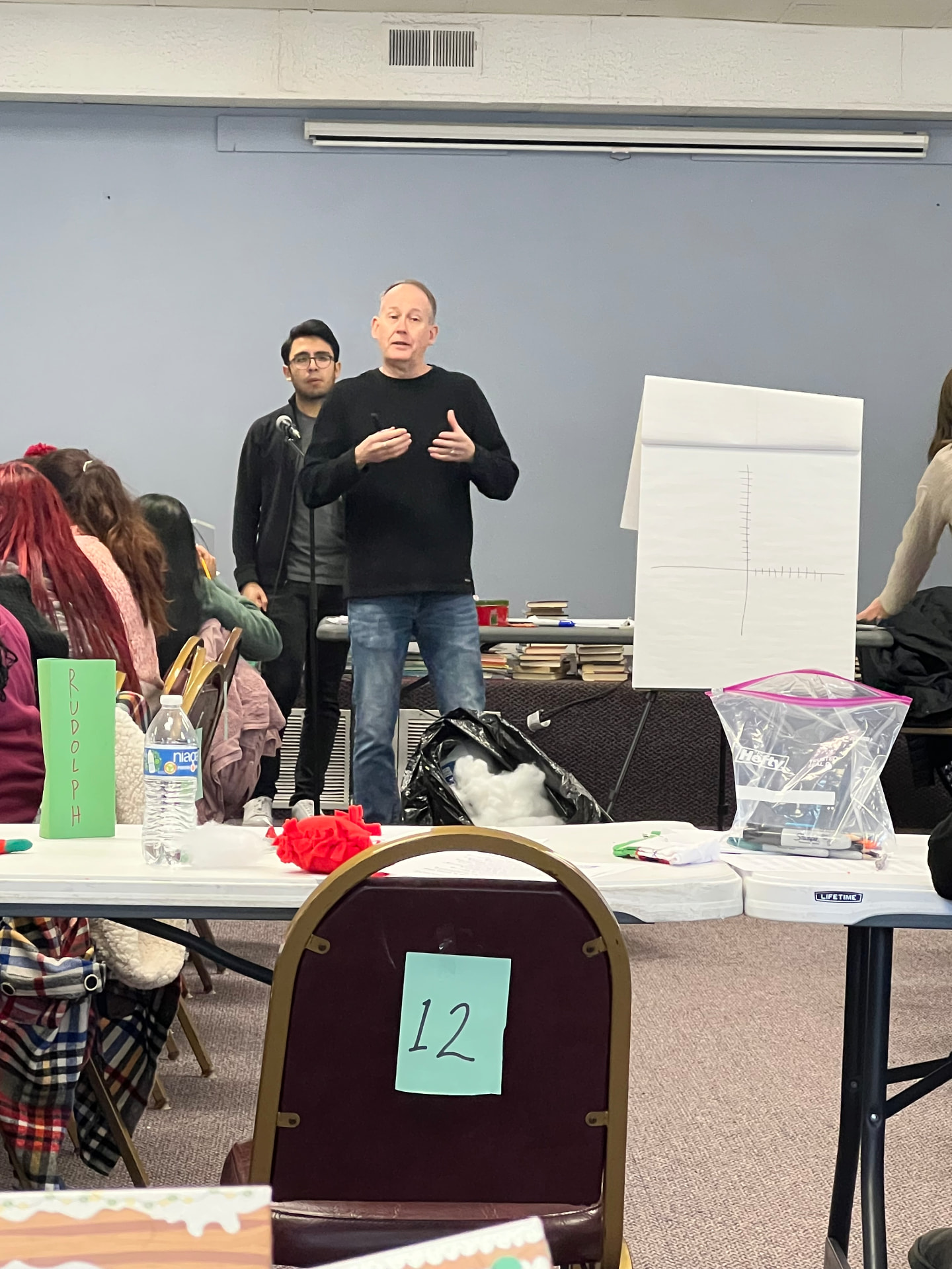 A speaker leading the parenting seminar at Hope For The Family