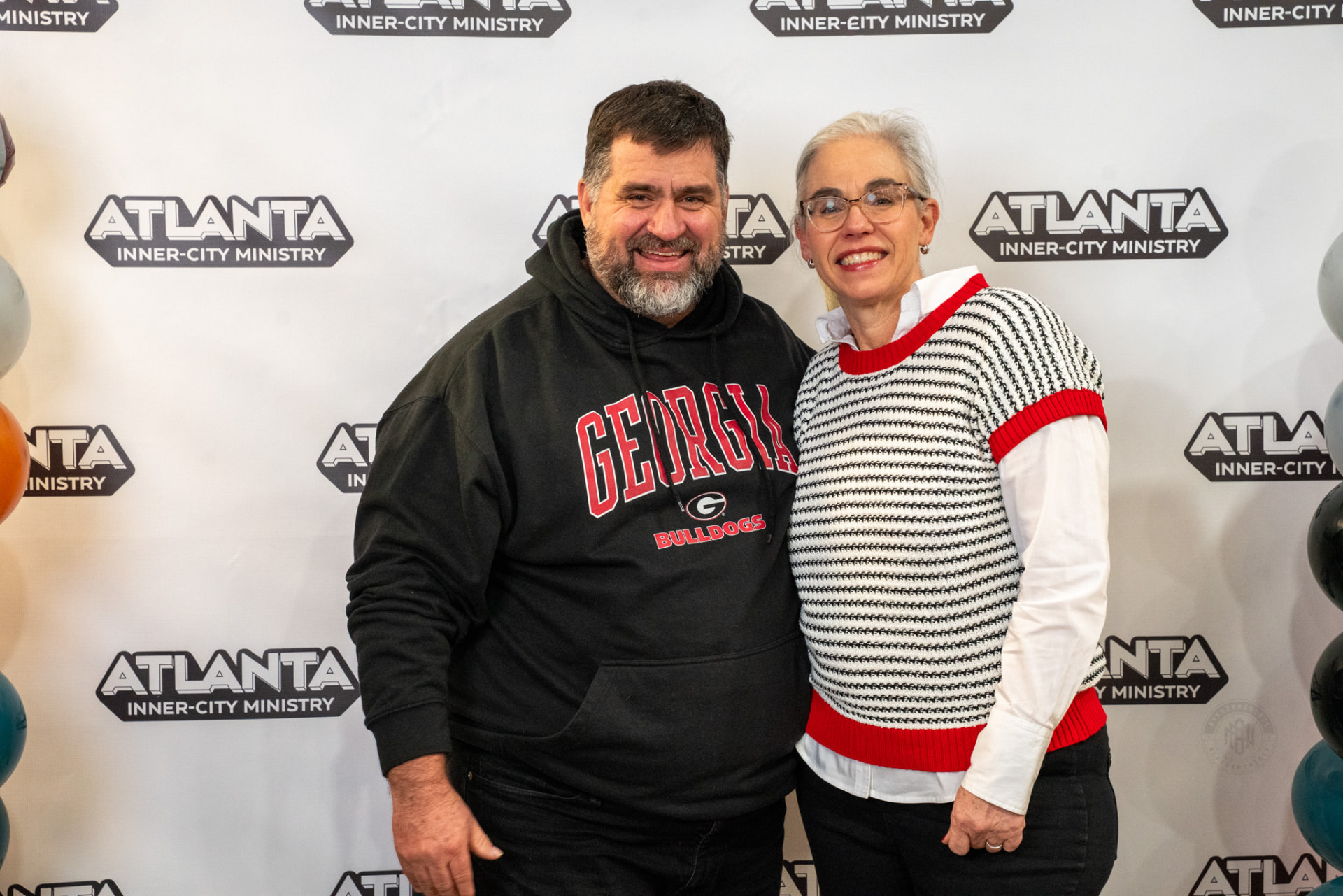 A couple posing at a past AIM Victory Banquet